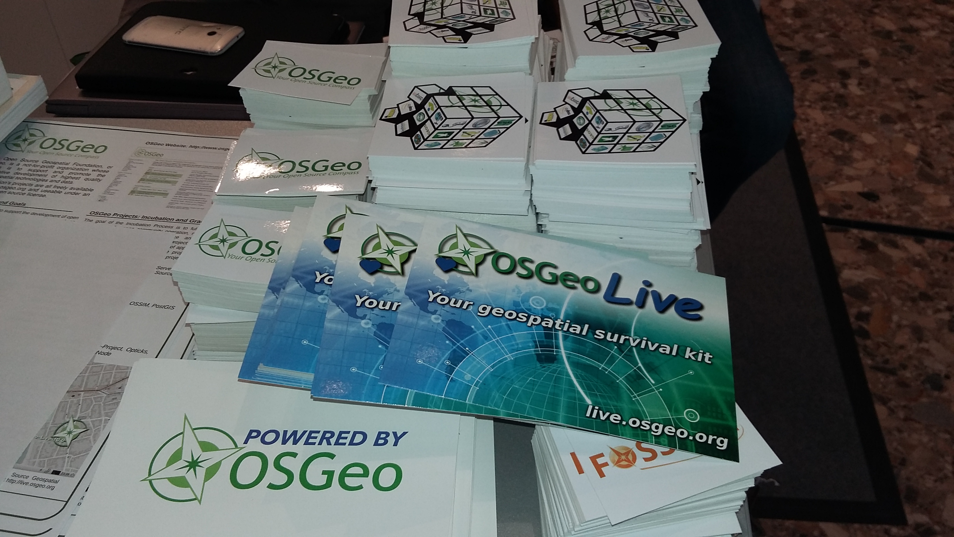 FOSS4G 2016 OSGeo Booth postcards sticker.jpg